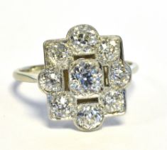 ART DECO & ESTATE CUT DIAMOND RING Set in platinum, pierced geometric mount, mille grain set with