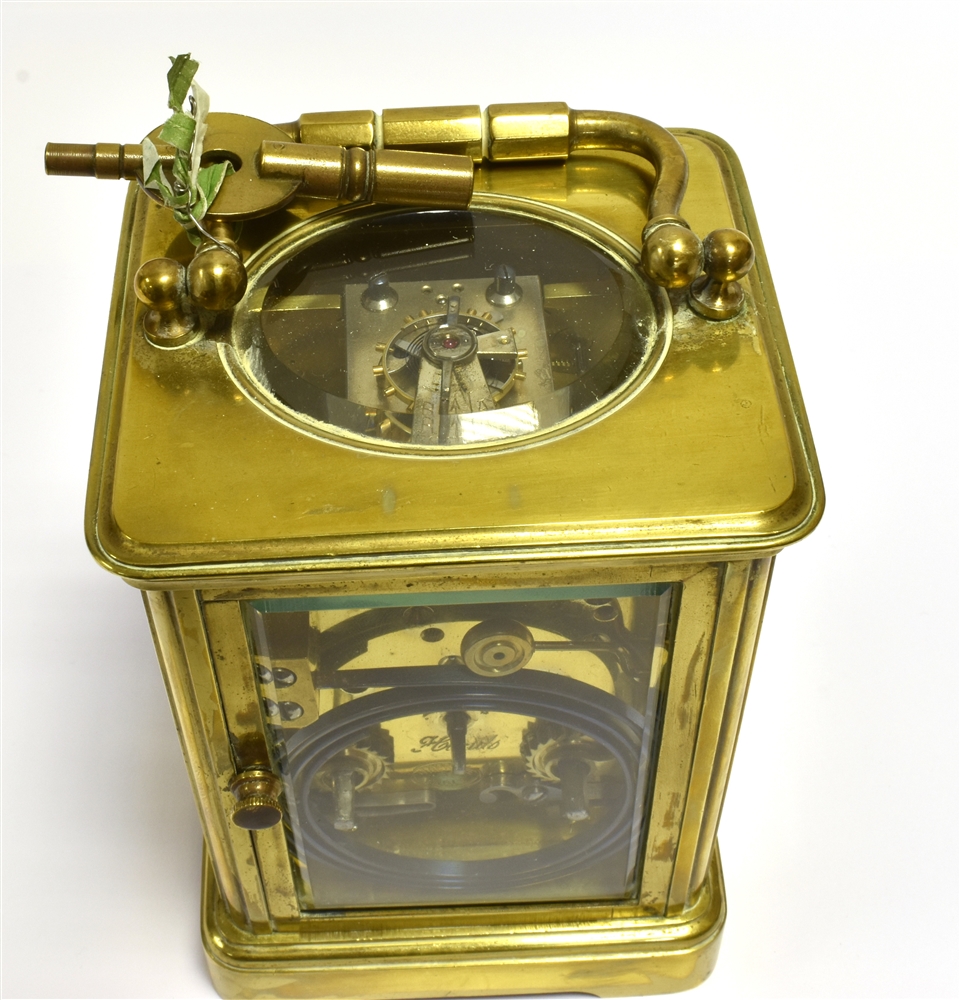 BRASS CARRIAGE CLOCK Retailed by Howell & James Ltd, London, stands 12cm tall, with five bevelled - Image 4 of 4