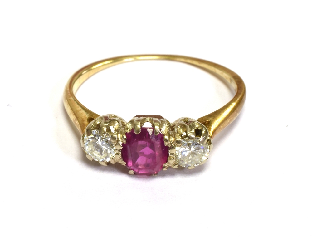 VINTAGE RUBY & DIAMOND TRILOGY RING In 18ct gold with central coronet claw set ruby, estimated 0.