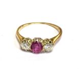 VINTAGE RUBY & DIAMOND TRILOGY RING In 18ct gold with central coronet claw set ruby, estimated 0.