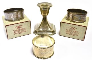 VARIOUS ANTIQUE SILVER ITEMS To include a silver candlestick with loaded base, two boxed oval