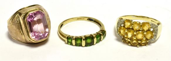 9CT GOLD GEM SET DRESS RINGS One set with round peridots, and one set with round citrines and single