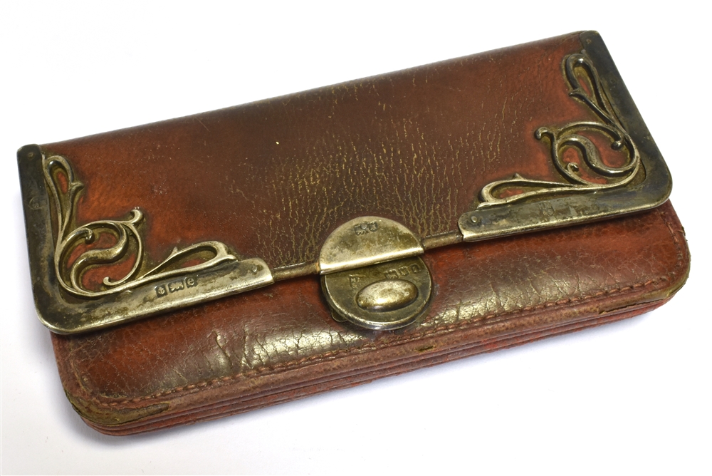 ART NOUVEAU SILVER MOUNTED PURSE 11.0cm long x 5.8cm wide, leather purse with silver mounted Art
