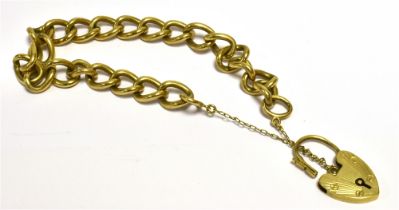 9CT GOLD CURB LINK BRACELET 18cm long x 8.5mm wide, solid gold curb links, with heart shaped padlock