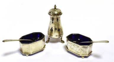 GEORGE V SILVER SALTS & PEPPERETTE A pair of blue glass lined octagonal salts with spoons (one is