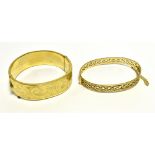 9CT GOLD PLATED BANGLES One 18.3mm wide hinged cuff bangle with foliate and scroll engraving,