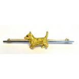 9CT GOLD TERRIER BAR BROOCH 5cm long bar, decorated with applied 1.7cm long, realistically