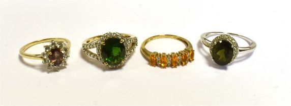 9CT GOLD DRESS RINGS All stamped 375 9K and set with a various stones, including colourless