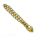 9CT GOLD CURB LINK BRACELET 22cm long x 8.9mm wide, solid curb link chain secured by a 1.8cm wide,