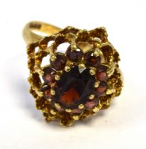 9CT GOLD & GARNET DRESS RING 19.0 x 17.2mm open work cluster head, set with pyrope and almandine