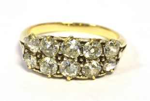 18CT GOLD & ESTATE CUT DIAMOND RING Two rows of claw set old European & Swiss cut diamonds,
