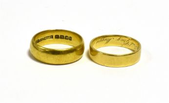 18CT GOLD WEDDING BANDS One 6.4mm wide, ring size S 1/2, hallmarked 18 London 1966. One 5.3mm