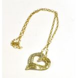 9CT GOLD & DIAMOND SET PENDANT Heart shaped pendant, 2.8cm long x 2.5cm wide, with channel set