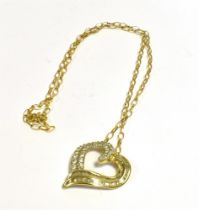 9CT GOLD & DIAMOND SET PENDANT Heart shaped pendant, 2.8cm long x 2.5cm wide, with channel set