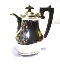ART DECO SILVER COFFEE POT Standing 22.0cm tall, of geometric form with classical handle on orb