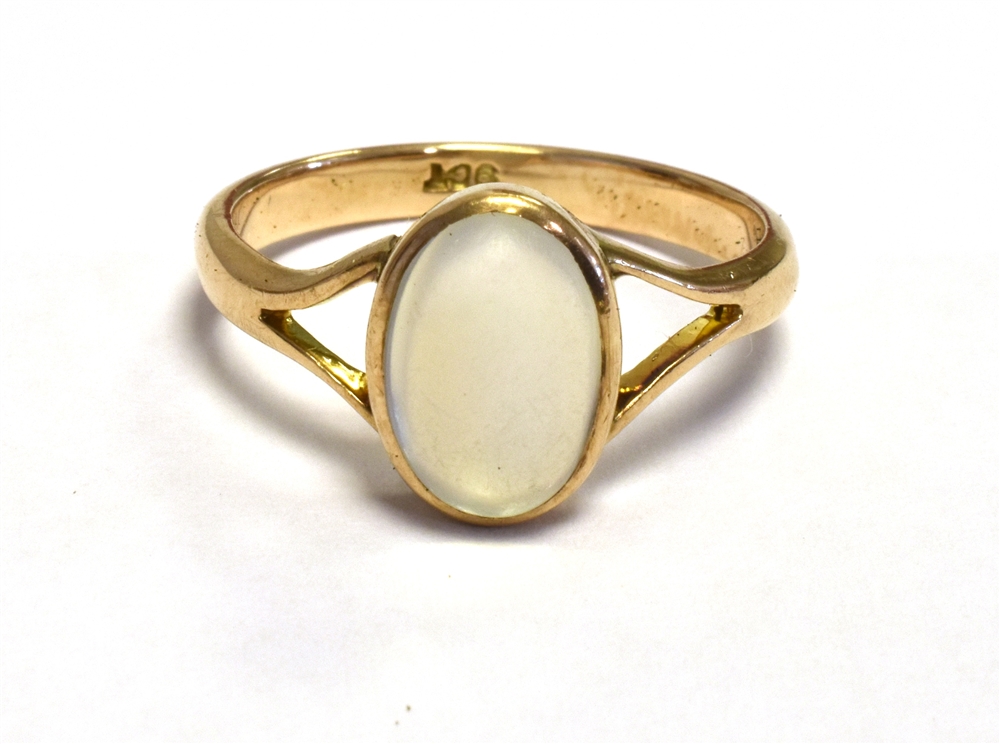 9CT GOLD MOONSTONE DRESS RING Oval cabochon moonstone, collet set in 9ct gold shank, ring size R.