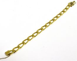 18CT GOLD CURB LINK BRACELET 20cm long x 7.7mm wide, solid filed curb link with concealed tongue