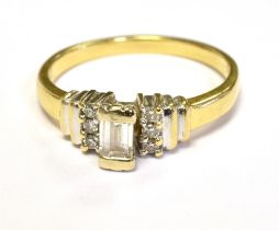 18CT GOLD DIAMOND RING The ring centrally set with a baguette cut diamond. Measuring approx 4mm x