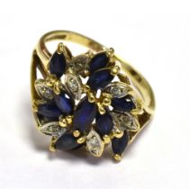 9CT GOLD SAPPHIRE & DIAMOND RING 15.5mm claw set swirling cluster ring, set with navette cut