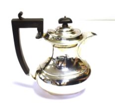 ART DECO SILVER COFFEE POT Standing 19.0cm tall, of baluster form with classical handle and flat