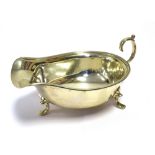 ANTIQUE SILVER SAUCE BOAT 16.0cm long standing 4.5cm tall, on shell topped scroll feet. Hallmarked