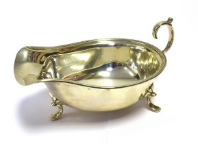 ANTIQUE SILVER SAUCE BOAT 16.0cm long standing 4.5cm tall, on shell topped scroll feet. Hallmarked