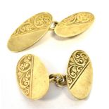 VICTORIAN 9CT GOLD CUFFLINKS 19.0 x 9.5mm, oval partially scroll and foliate engraved cufflinks.