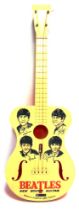A SELCOL BEATLES NEW SOUND GUITAR cream and orange plastic, with printed group-member portraits