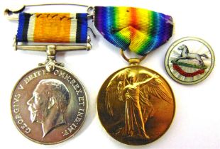 A GREAT WAR PAIR OF MEDALS TO PRIVATE W.T. SMIDDY, WEST YORKSHIRE REGIMENT comprising the British