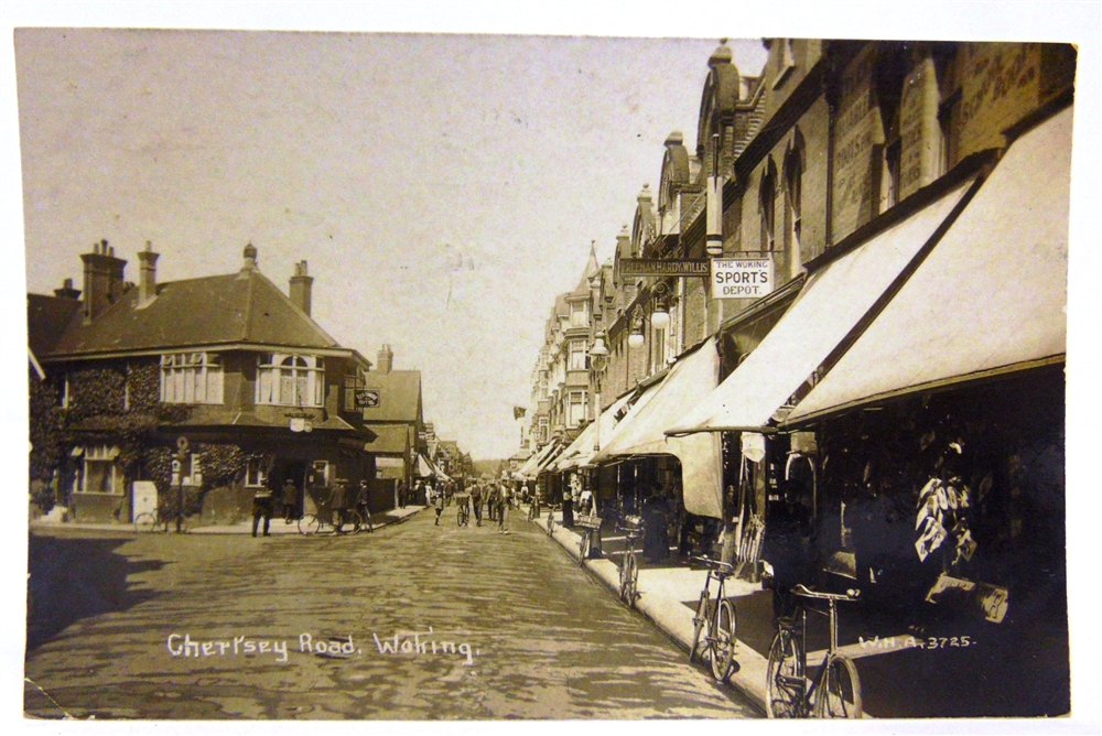 POSTCARDS - SURREY Approximately 143 cards, including real photographic views of Chertsey Road,