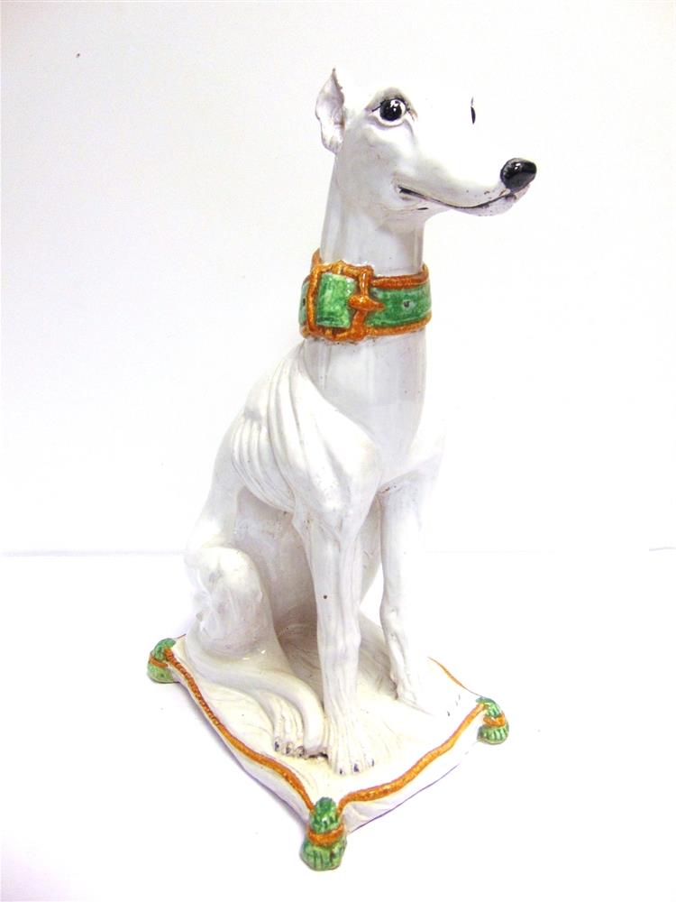A LARGE GLAZED POTTERY MODEL OF A GREYHOUND SEATED ON A CUSHION white, with pale brown and green - Image 2 of 4