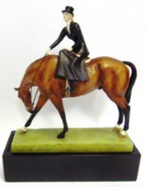 A ROYAL WORCESTER MODEL 'AT THE MEET' by Doris Lindner, No. 3114, depicting a lady riding side