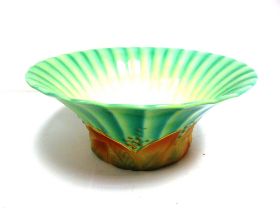 A ROYAL WORCESTER BOWL circa 1933, with a fluted, flared rim and a band of Art Deco style leaves