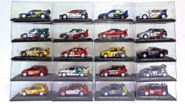 TWENTY 1/43 SCALE PART-WORK DIECAST MODEL RALLY CARS based on entrants from the 2000s, each mint