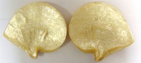 TWO CHINESE CARVED MOTHER OF PEARL SHELLS 19th century, depicting battle scenes, a crenellated