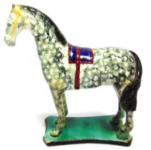 A PEARLWARE POTTERY MODEL OF A HORSE circa 1800-1820, probably North East potteries, with a