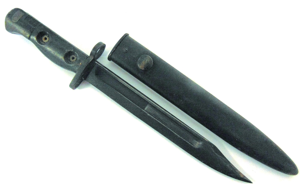 A POST SECOND WORLD WAR BRITISH L1A3 BAYONET the 20cm blade stamped at the ricasso 'B59', the grip