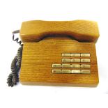 A GFELLER TRUB SOLID WOOD TELEPHONE Swiss, with maker's labels to base, 21cm wide, 19cm deep.