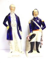 TWO STAFFORDSHIRE PORTRAIT FIGURES comprising 'Wellington', standing in a blue frock coat, with a