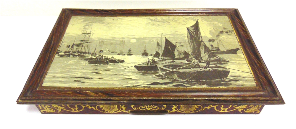 A HUNTLEY & PALMERS BISCUIT TIN, 'SUNSET', 1903 depicting tugs, lighters and barges on the river