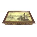 A HUNTLEY & PALMERS BISCUIT TIN, 'SUNSET', 1903 depicting tugs, lighters and barges on the river