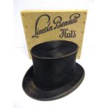 A BLACK BRUSHED SILK PLUSH TOP HAT, LINCOLN BENNET & CO., LONDON approximate size 7 1/8, boxed.