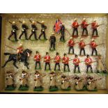 TWENTY-SEVEN BRITAINS MODEL SOLDIERS including those of British infantry, Royal Marines, and Russian