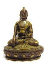 A BRASS SEATED BUDDHA the base with impressed decorative marks, overall 18.5cm high. Provenance: