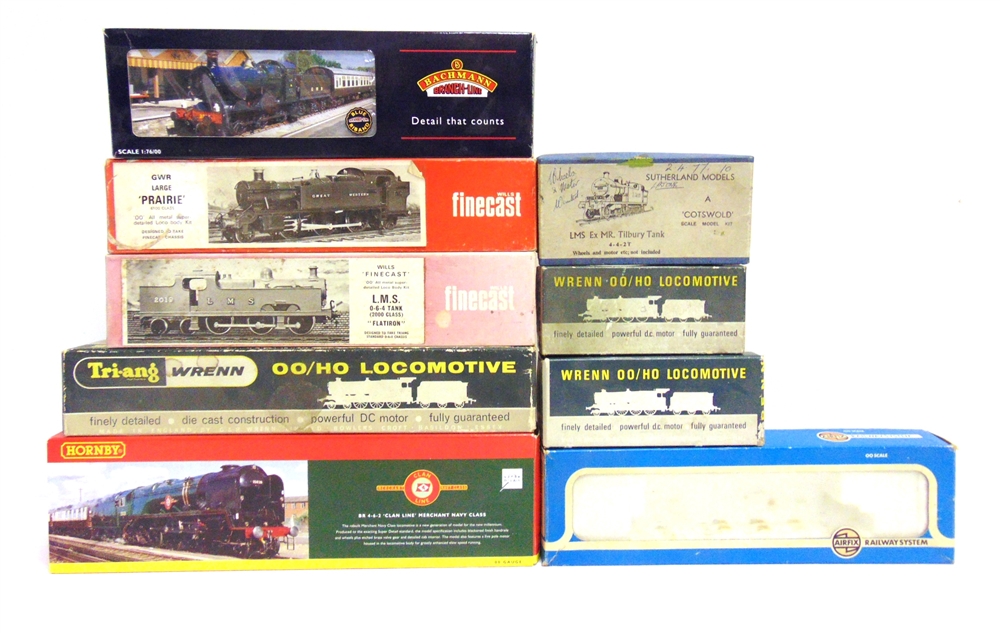 [OO GAUGE]. NINE EMPTY LOCOMOTIVE BOXES comprising those for a Tri-ang Wrenn No.2218, B.R. 4MT 2-6-4