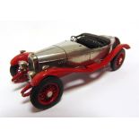 [WHITE METAL]. A 1/43 SCALE K. & R. REPLICAS 1926 ALVIS 12/50 'DUCK-BACK' polished bare metal with a