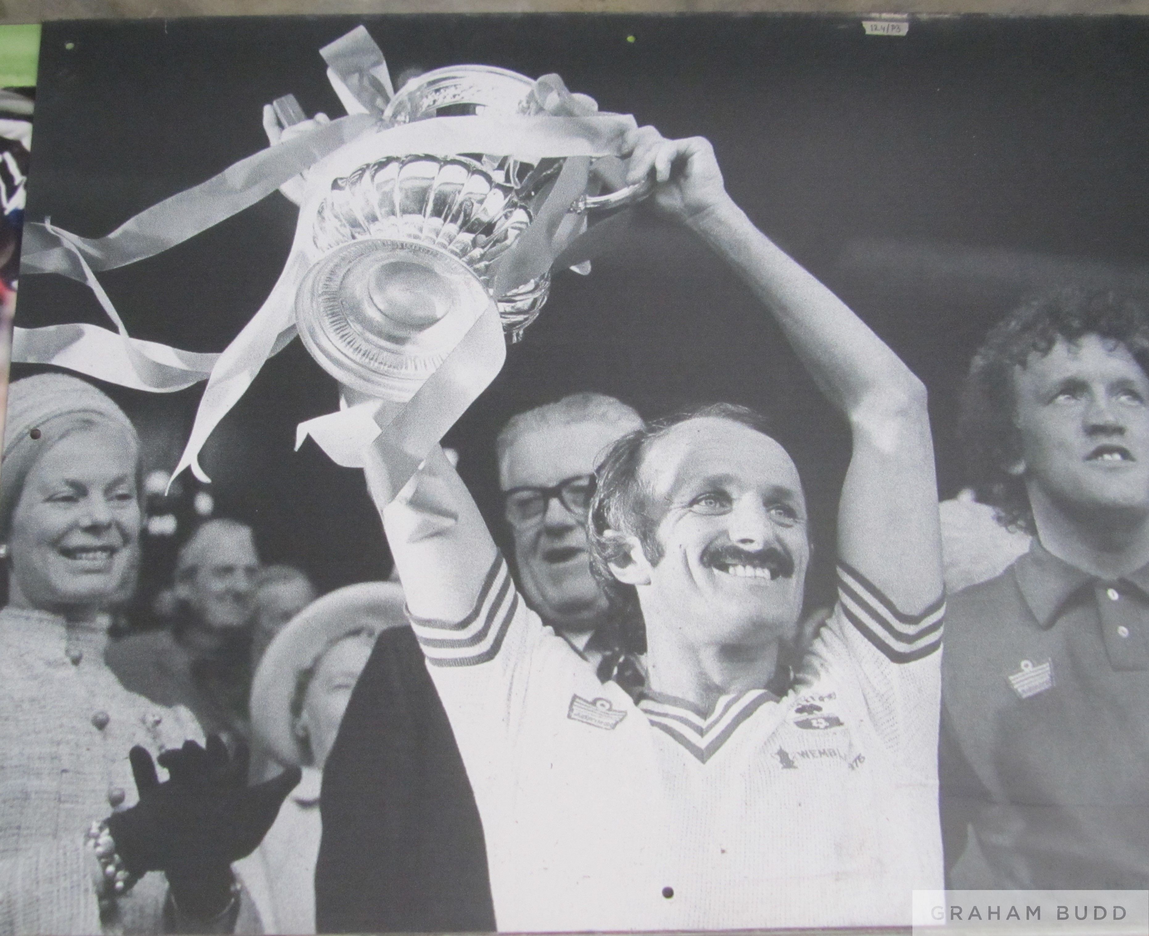 Southampton's Peter Rodrigues holding aloft the 1976 FA Cup v Manchester United, - Image 2 of 3