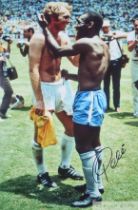 Edson Pele signed colour photograph featuring Pele exchanging shirt with Bobby Moore