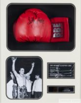 A Sir Henry Cooper signed glove display