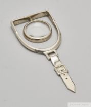 Novelty white-metal magnifying glass, modelled as a stirrup